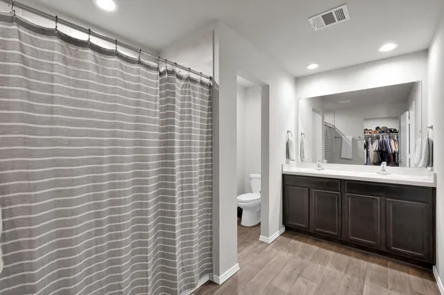 a bathroom with a sink and a toilet