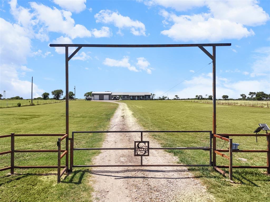 511 East Pecan Tree Road Waxahachie, TX 75165 - Photo 2 of 36 Fully fenced property with a solar powered gated entrance and long private driveway.