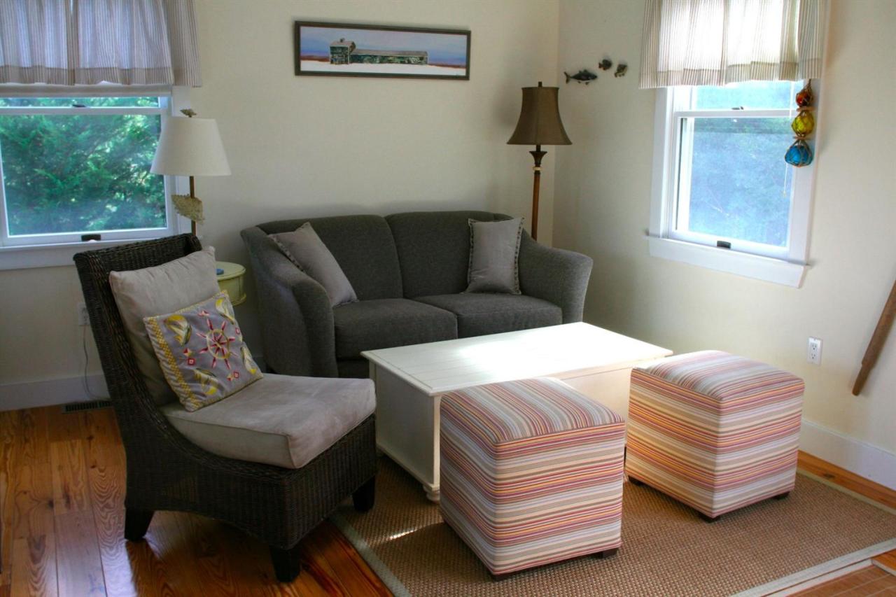 6 Shore Road, Unit 7 Truro, MA 02666 - Photo 5 of 12 a bedroom with bed and a window