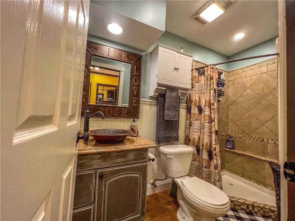 138 Rhoer Road Slippery Rock, PA 16057 - Photo 18 of 23 a bathroom with a toilet a sink and shower