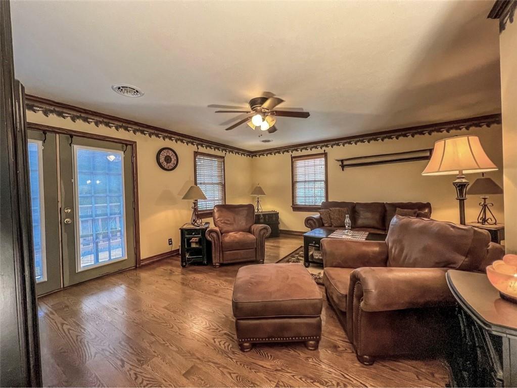 138 Rhoer Road Slippery Rock, PA 16057 - Photo 4 of 23 a living room with furniture and a chandelier
