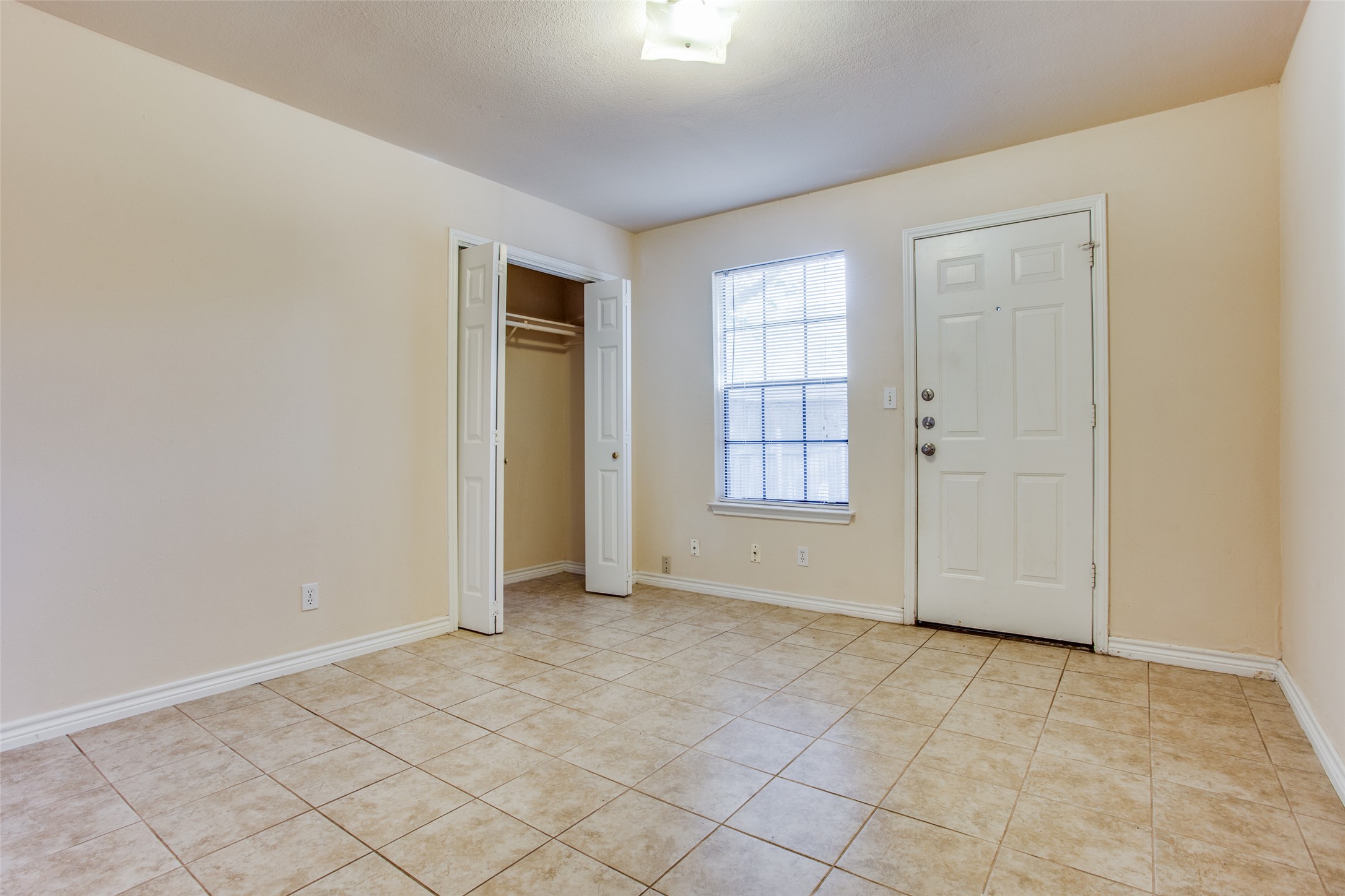 8811 Clearbrook Trail Austin, TX 78729 - Photo 38 of 38 rt B - Functional floorplan features a window, closet, and durable tile flooring throughout.