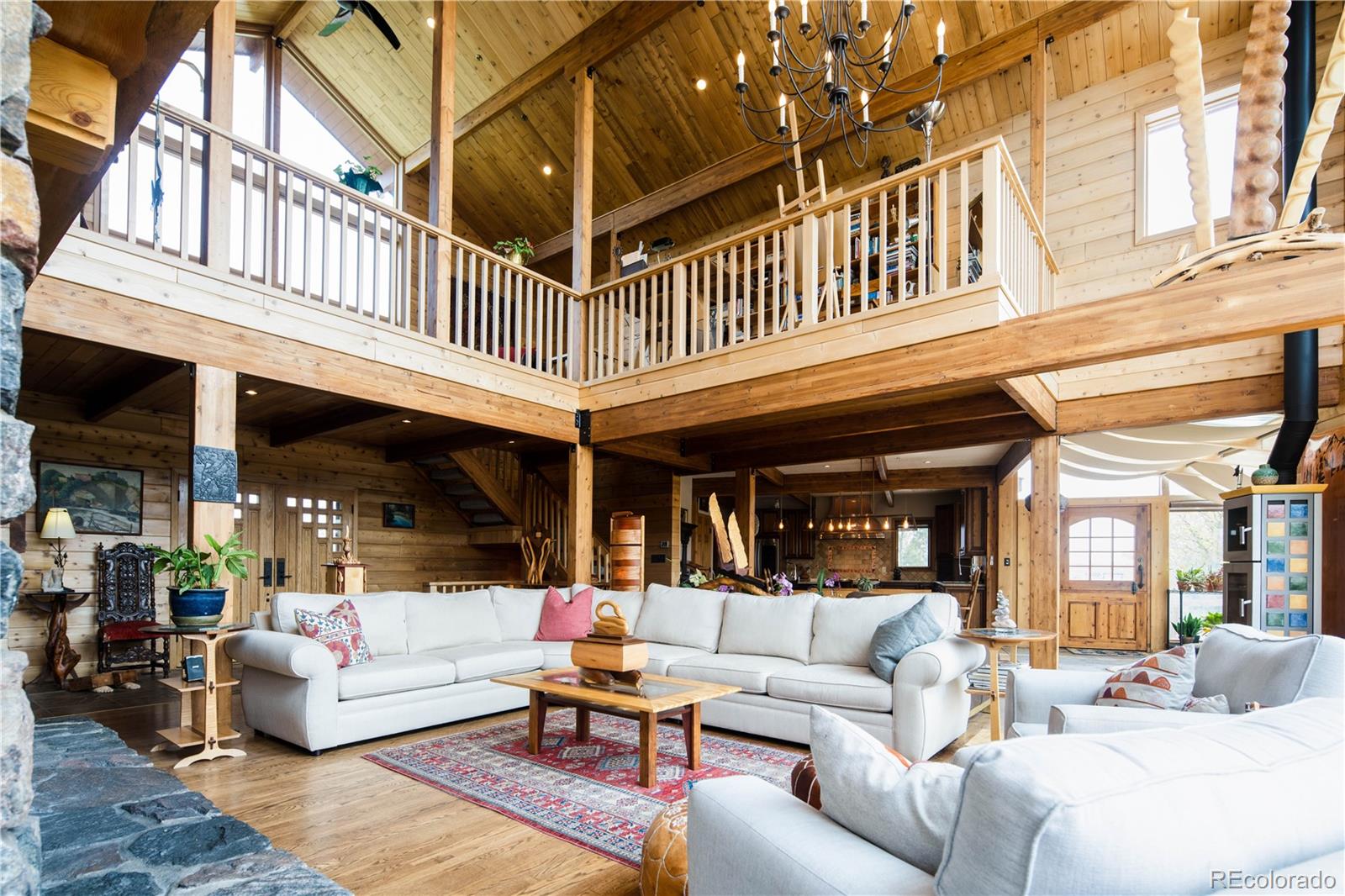 729 Coronado Drive Sedalia, CO 80135 - Photo 3 of 28 a view of a building and a couch