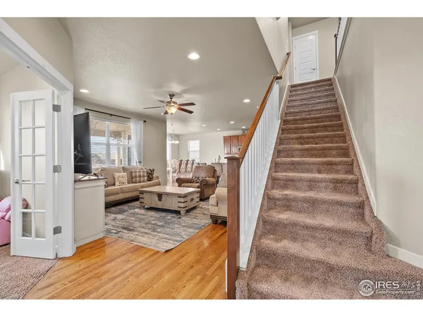 a view of a living room and entry way