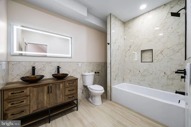 a bathroom with a sink and a toilet