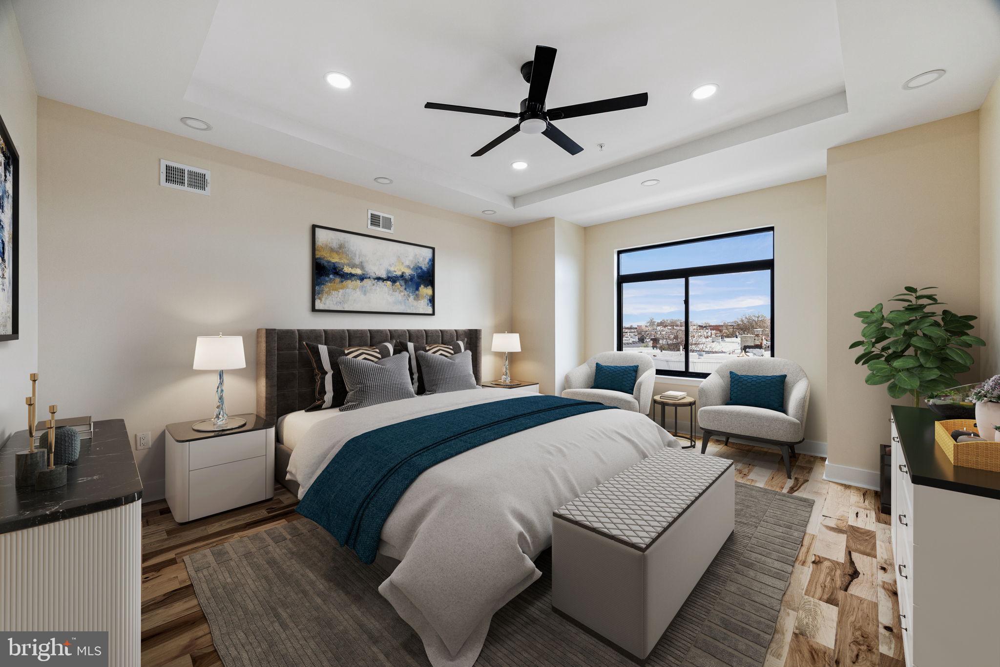 272 South Frazier Street Philadelphia, PA 19139 - Photo 19 of 34 a bed room with bed and a chandelier