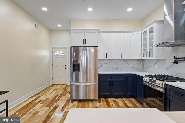 a kitchen with granite countertop lots of counter top space