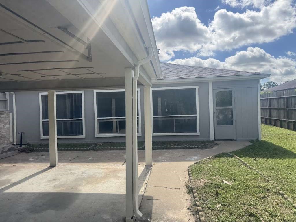 11807 South Youngwood Lane Houston, TX 77043 - Photo 2 of 13 a view of a backyard
