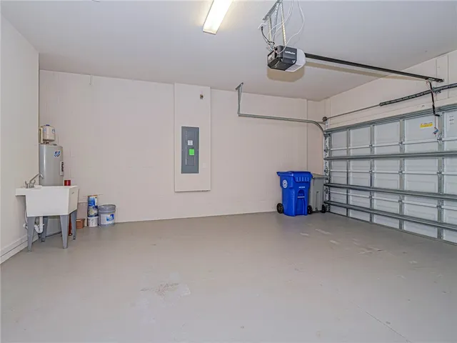 a view of a livingroom with furniture and natural light
