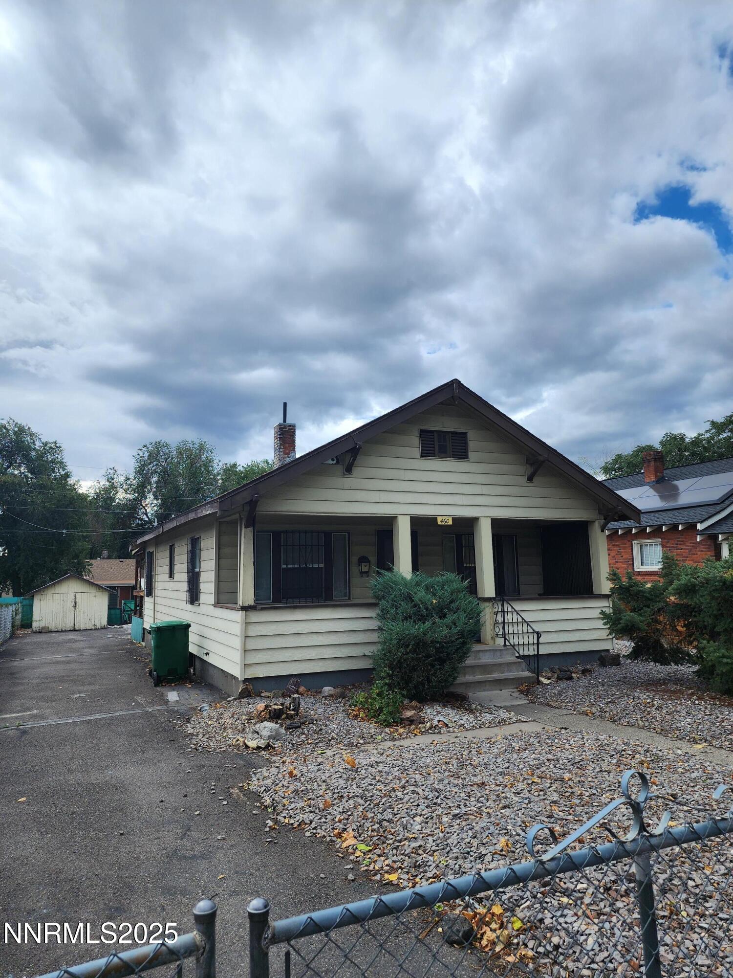 460 East 8th Street Reno, NV 89512 - Photo 2 of 6 a front view of house with yard and green space