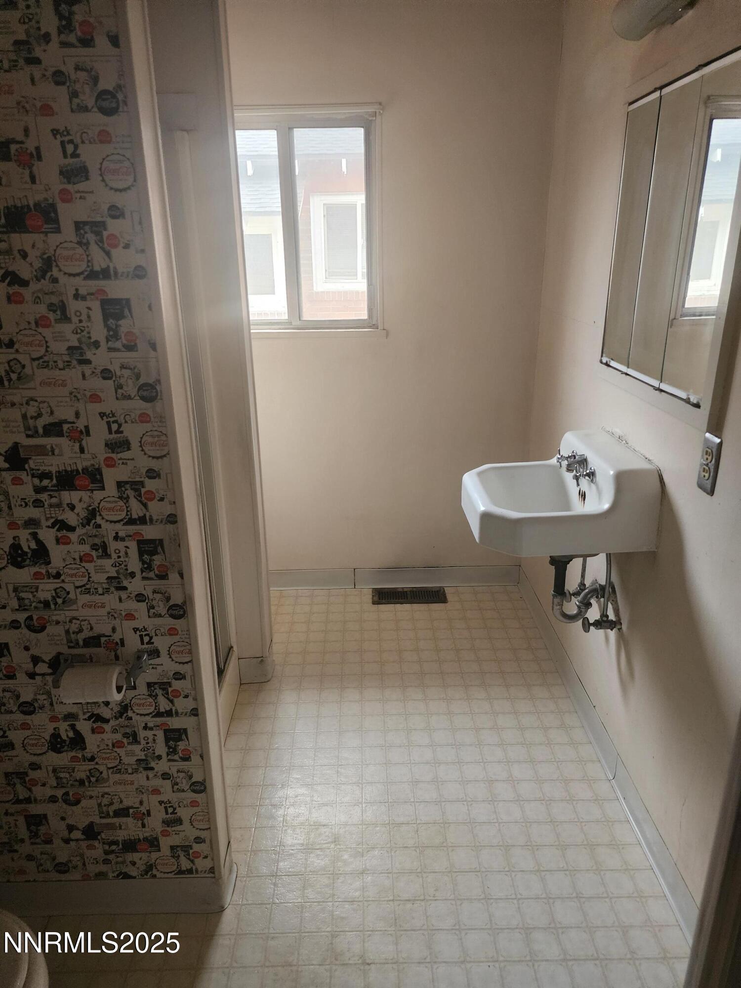 460 East 8th Street Reno, NV 89512 - Photo 5 of 6 a bathroom with a sink toilet and shower
