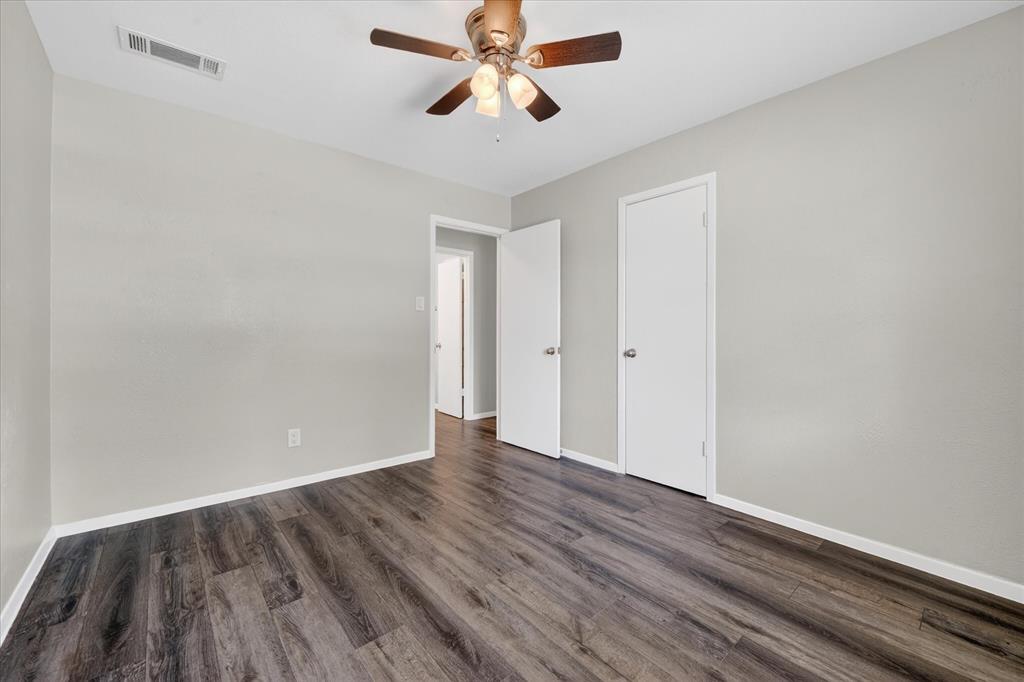 205 Wayne Street Sanger, TX 76266 - Photo 21 of 29 wooden floor in an empty room