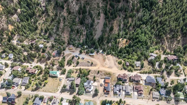 a view of houses with yard