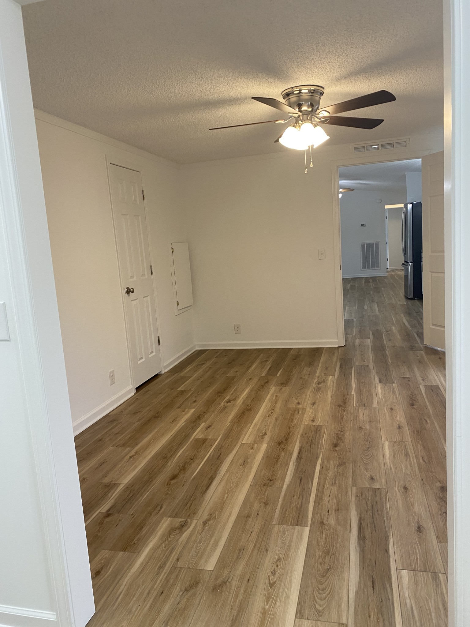 404 B Dorris Road, Unit B Portland, TN 37148 - Photo 11 of 24 a view of a room with wooden floor and staircase