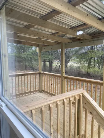 a view of a yard with an outdoor space