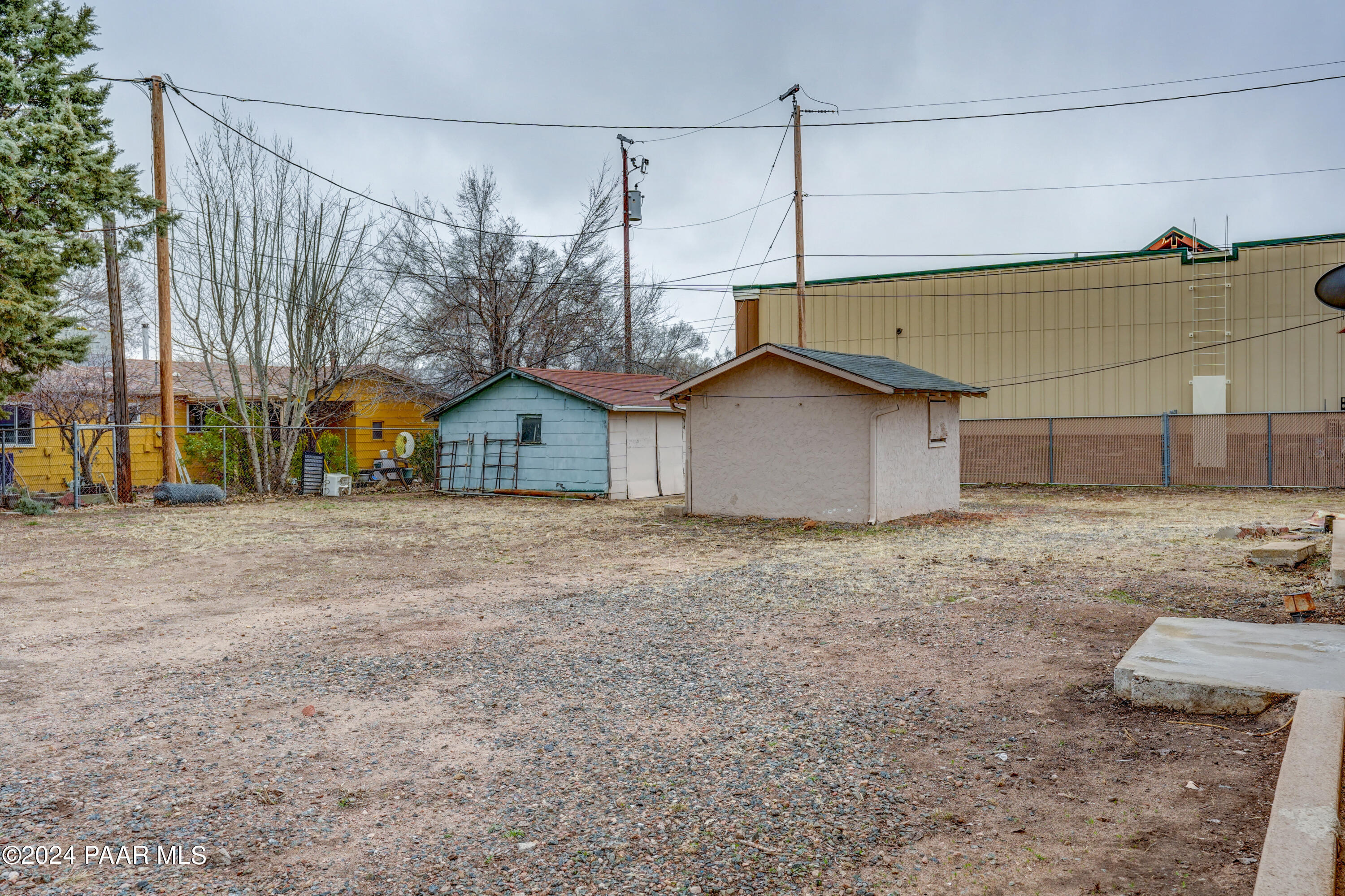 925 Ruth Street, Unit B Prescott, AZ 86301 - Photo 15 of 15 a view of a house with a backyard