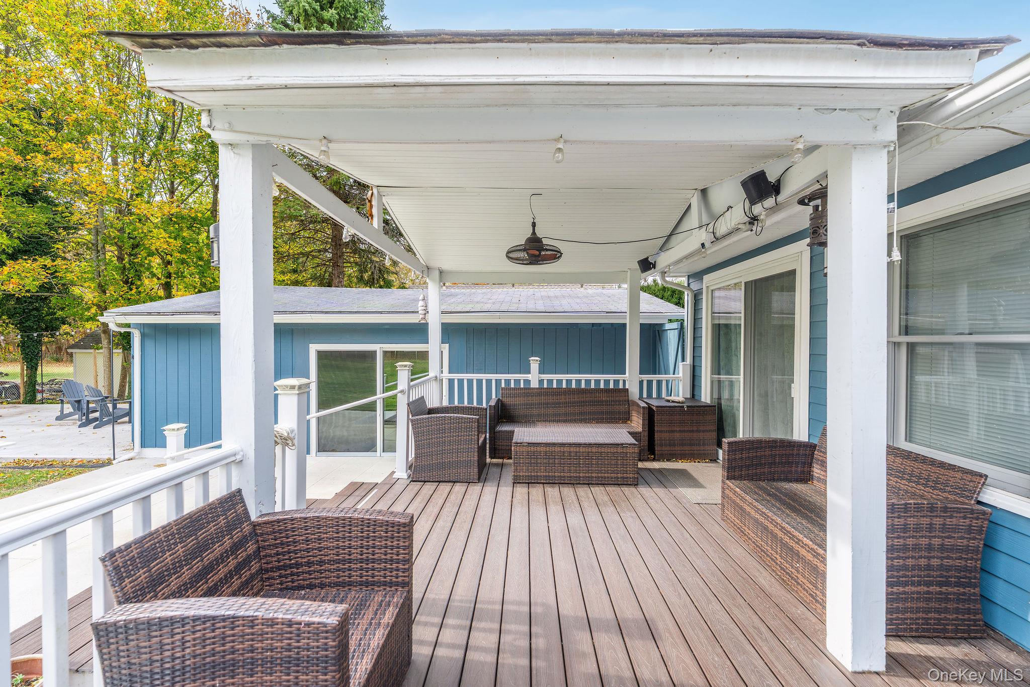 10940 Main Road East Marion, NY 11939 - Photo 22 of 38 a house view with a seating space
