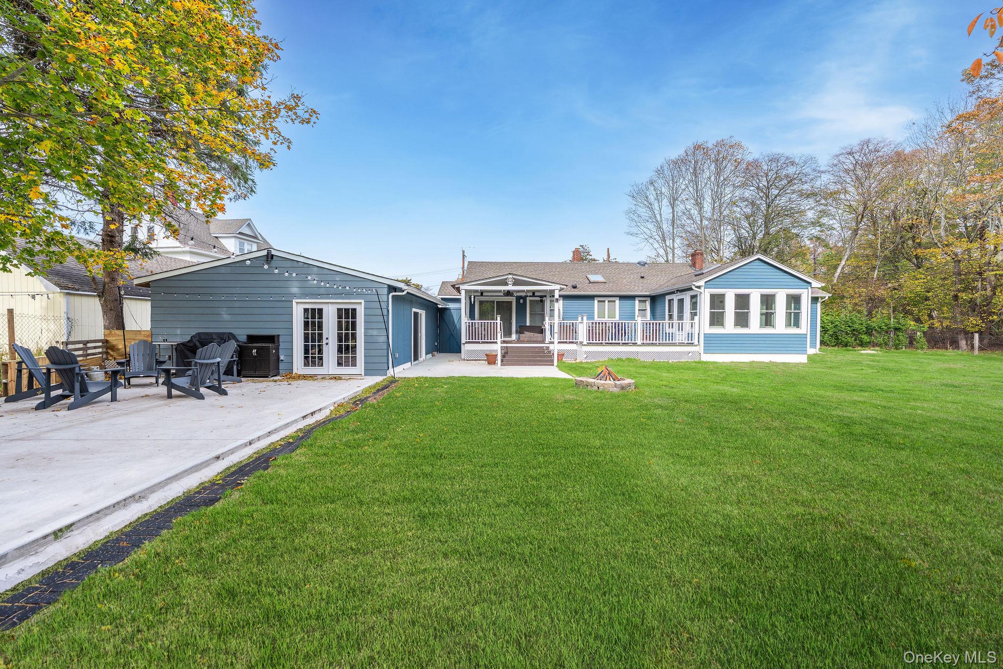 10940 Main Road East Marion, NY 11939 - Photo 27 of 38 a house view with a garden space