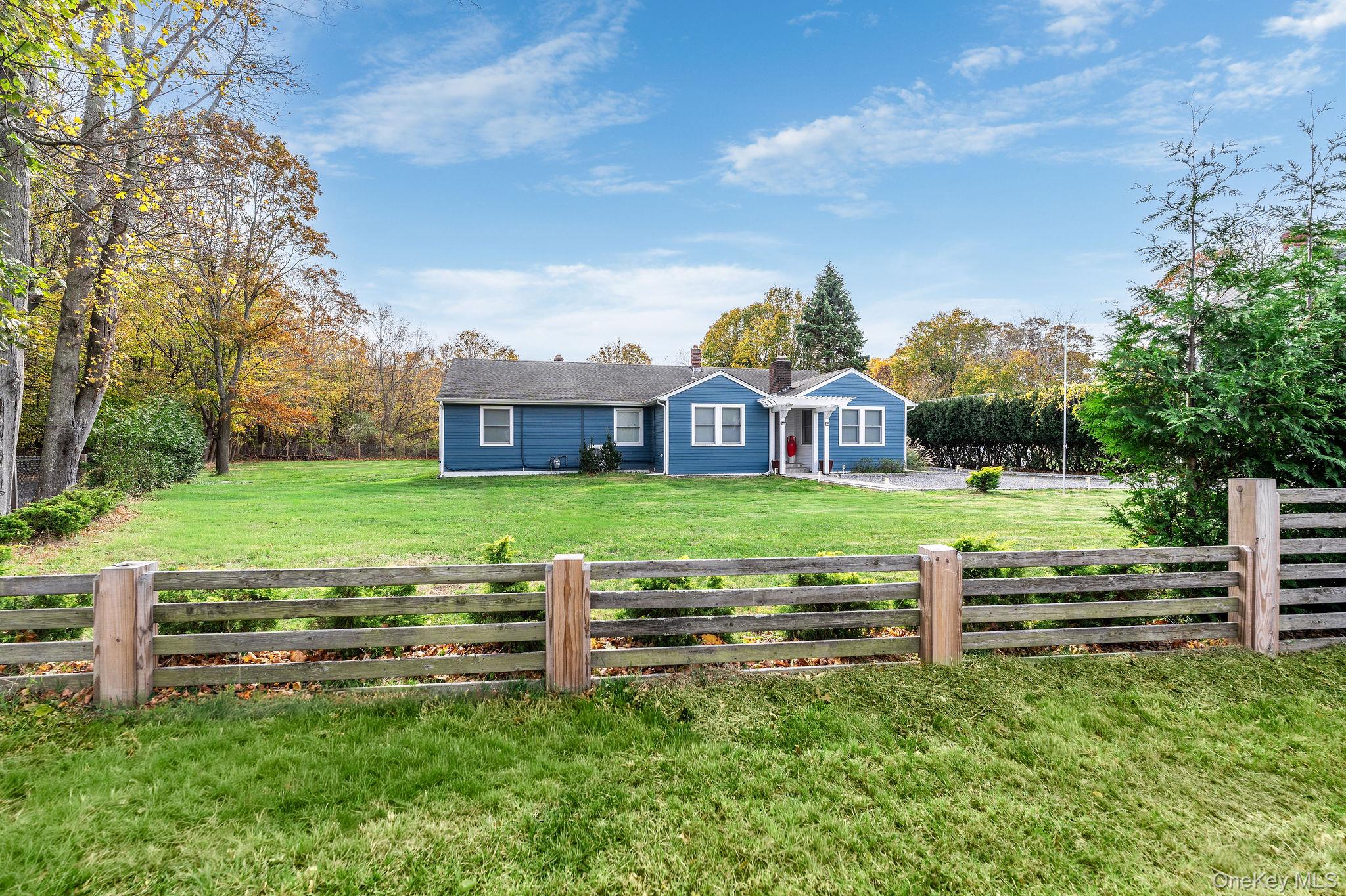 10940 Main Road East Marion, NY 11939 - Photo 33 of 38 a view of a house with a big yard