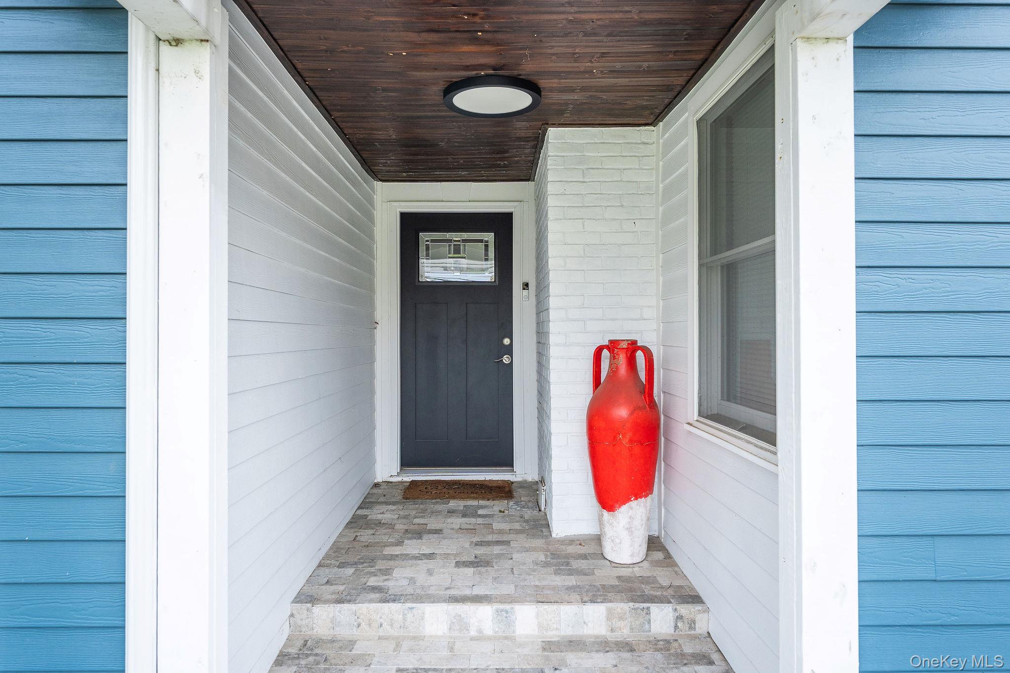 10940 Main Road East Marion, NY 11939 - Photo 4 of 38 a view of a brick wall