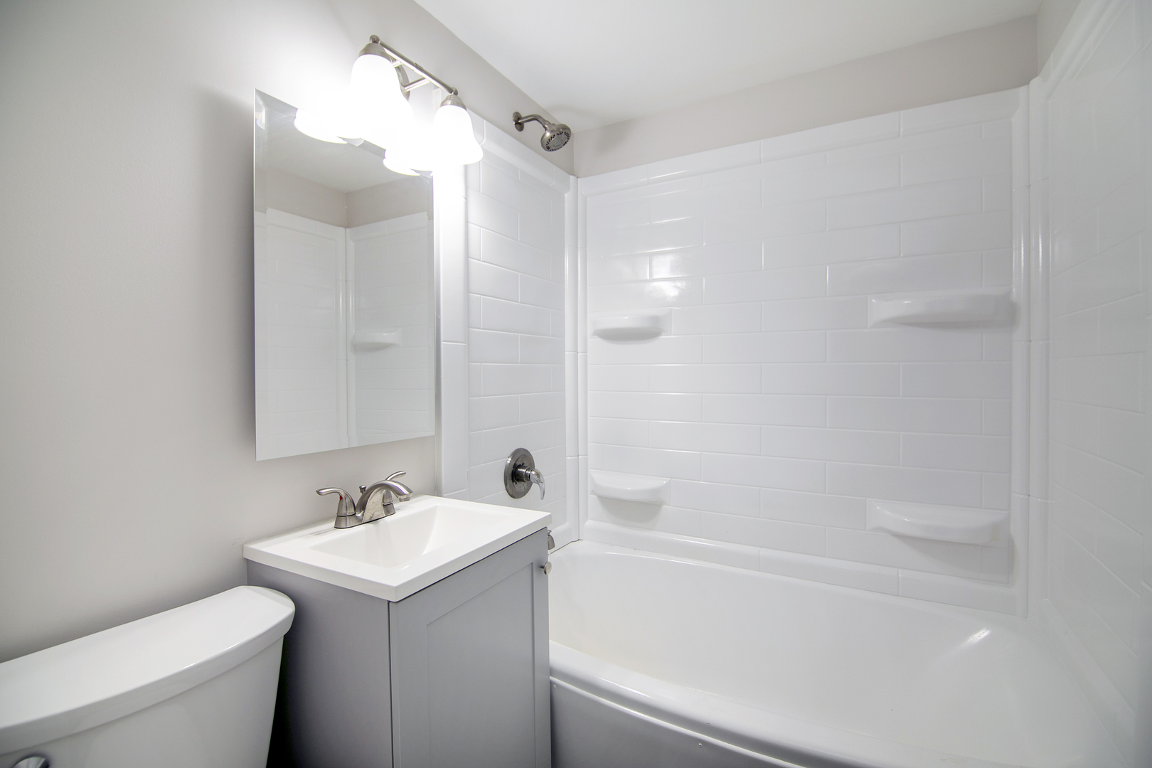 749 West New Monee Road Crete, IL 60417 - Photo 12 of 17 a bathroom with a sink a toilet and shower