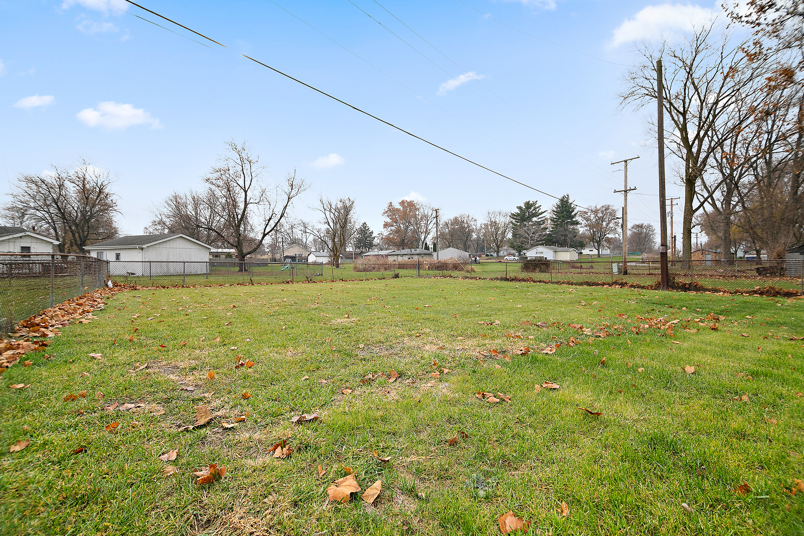 749 West New Monee Road Crete, IL 60417 - Photo 15 of 17 a view of a swimming pool with an outdoor space and seating area