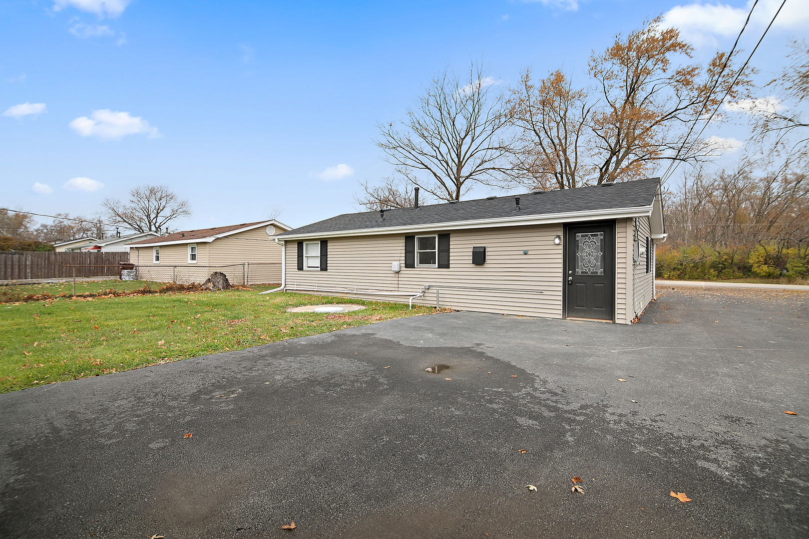749 West New Monee Road Crete, IL 60417 - Photo 17 of 17 a front view of a house with a garden and yard