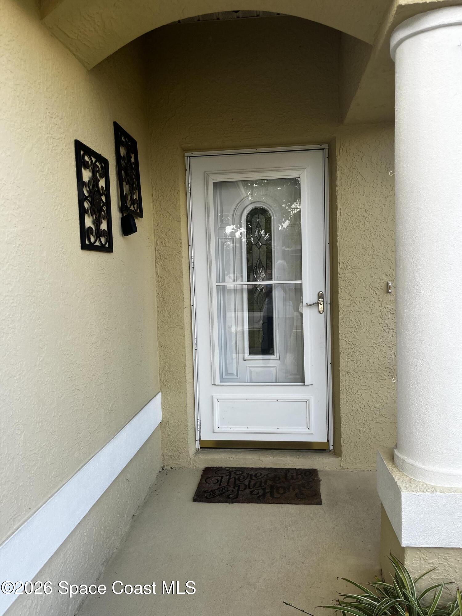 1219 Walnut Grove Way Rockledge, FL 32955 - Photo 3 of 23 a view of front door of house