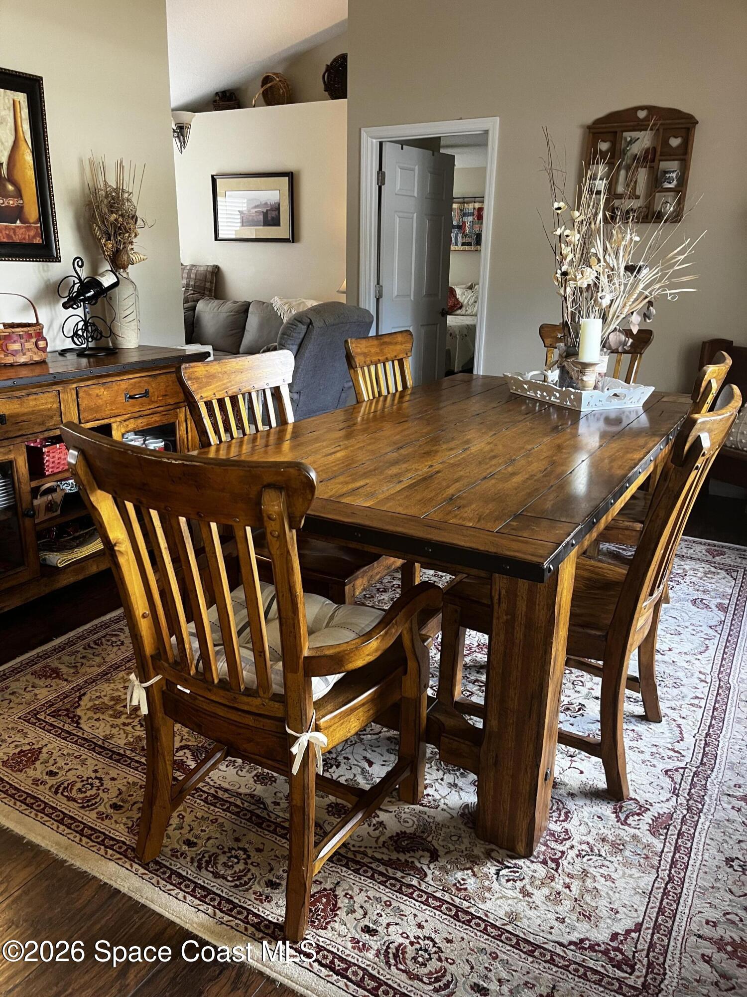 1219 Walnut Grove Way Rockledge, FL 32955 - Photo 10 of 23 a view of a dining room with furniture