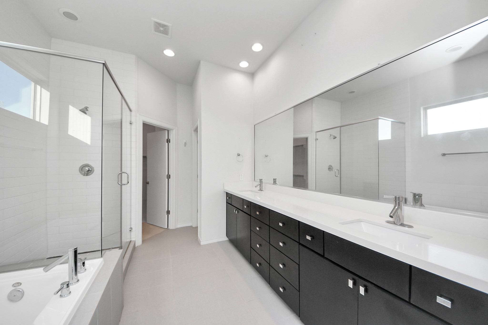 1315 Nagle Street Houston, TX 77003 - Photo 20 of 29 a bathroom with a double vanity sink mirror and double