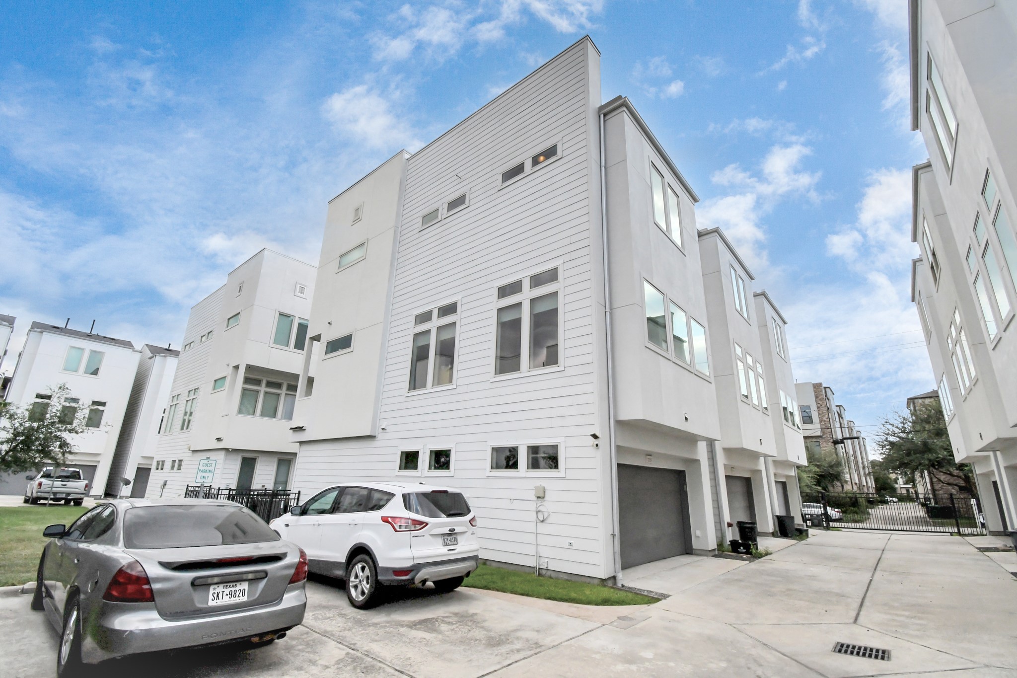 1315 Nagle Street Houston, TX 77003 - Photo 6 of 29 a view of a cars park in front of a building