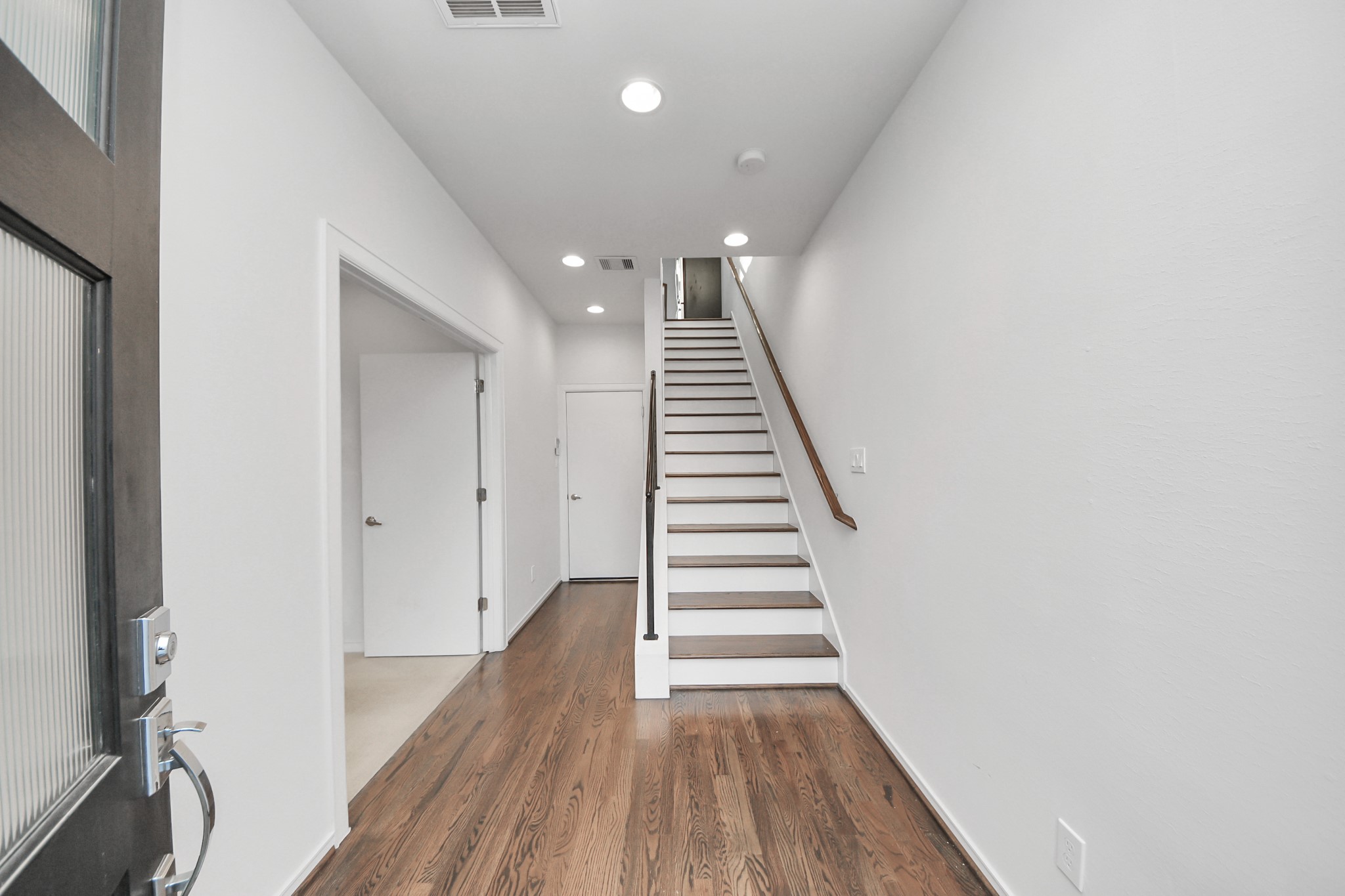 1315 Nagle Street Houston, TX 77003 - Photo 8 of 29 a view of entryway with wooden floor