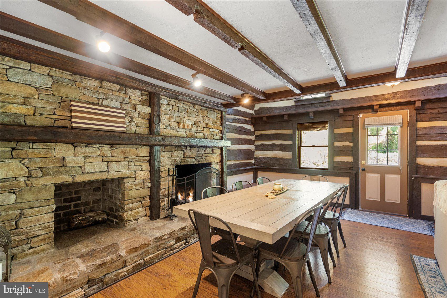 972 Bird River Beach Road Middle River, MD 21220 - Photo 14 of 50 a view of a dining room with furniture and wooden floor
