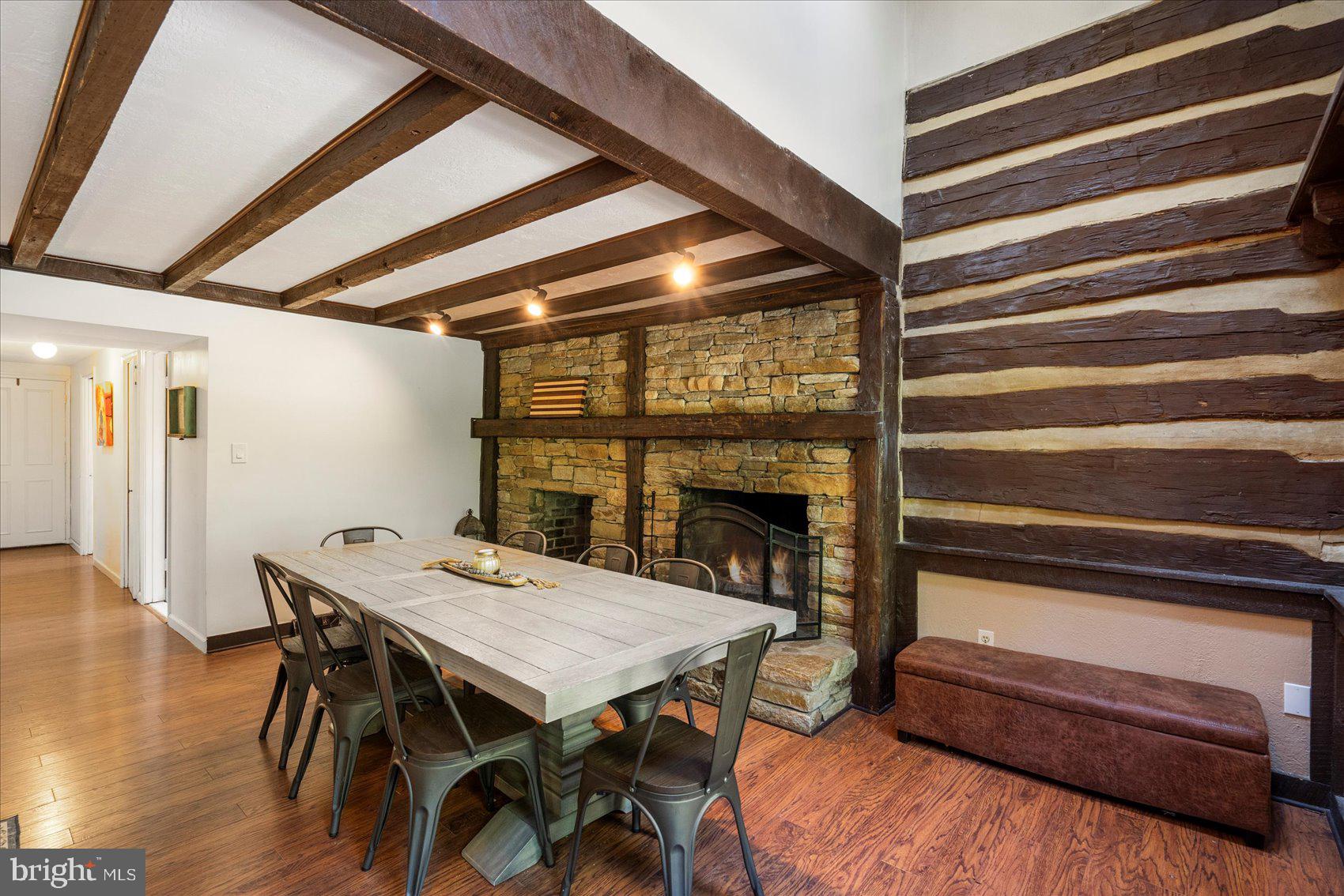 972 Bird River Beach Road Middle River, MD 21220 - Photo 15 of 50 a view of a dining room with furniture and wooden floor