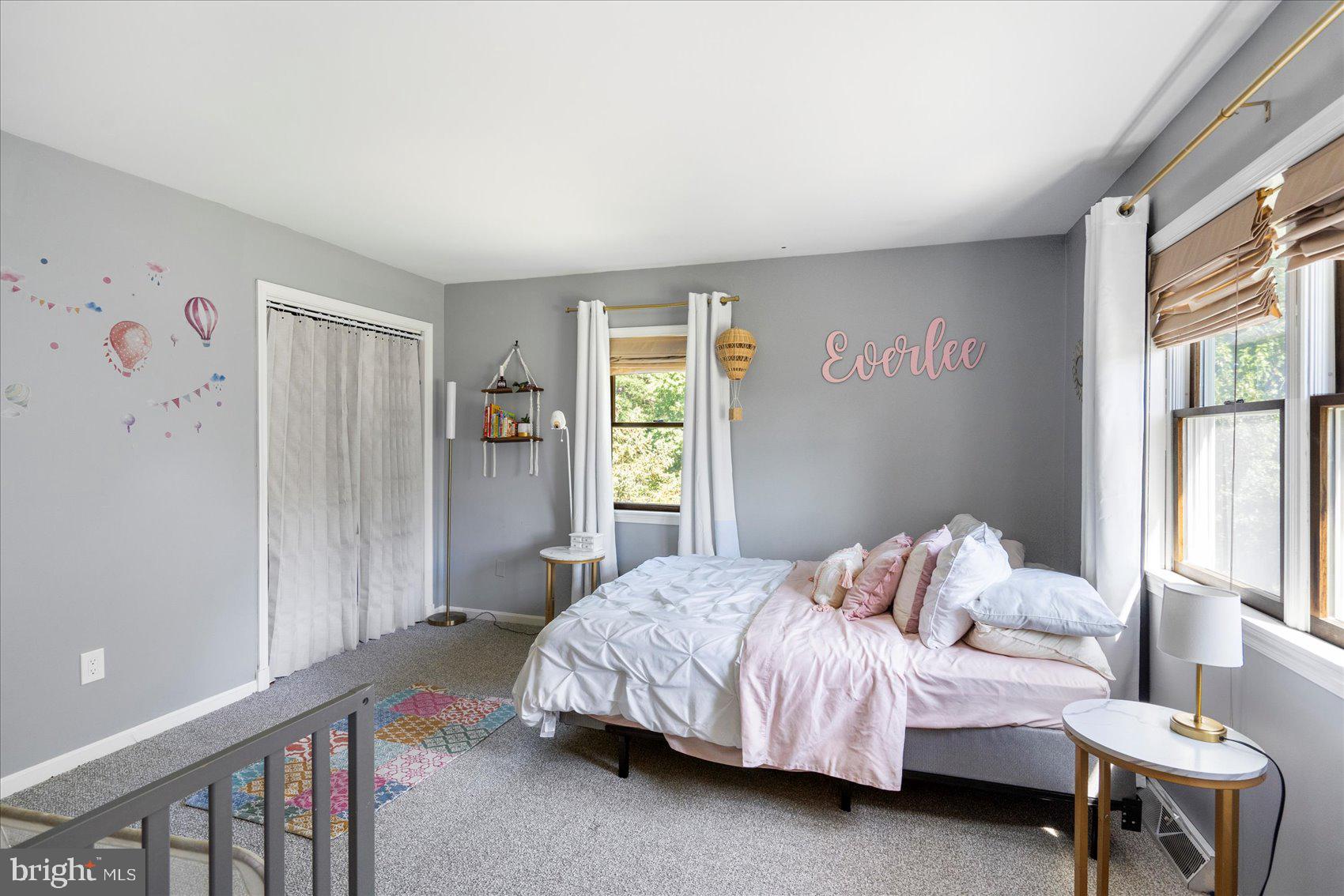 972 Bird River Beach Road Middle River, MD 21220 - Photo 28 of 50 a bedroom with a bed and a window