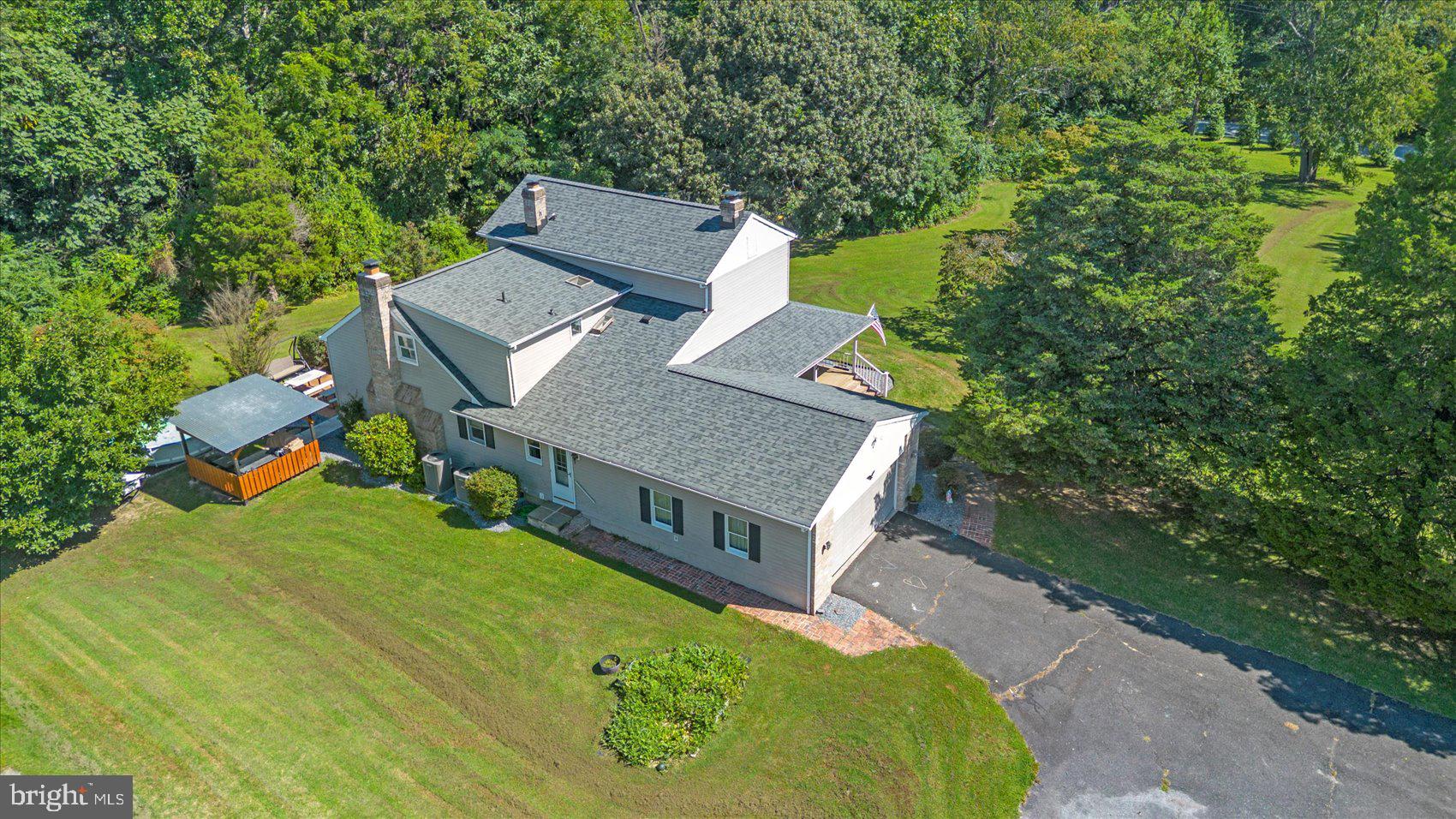 972 Bird River Beach Road Middle River, MD 21220 - Photo 40 of 50 an aerial view of a house with a big yard