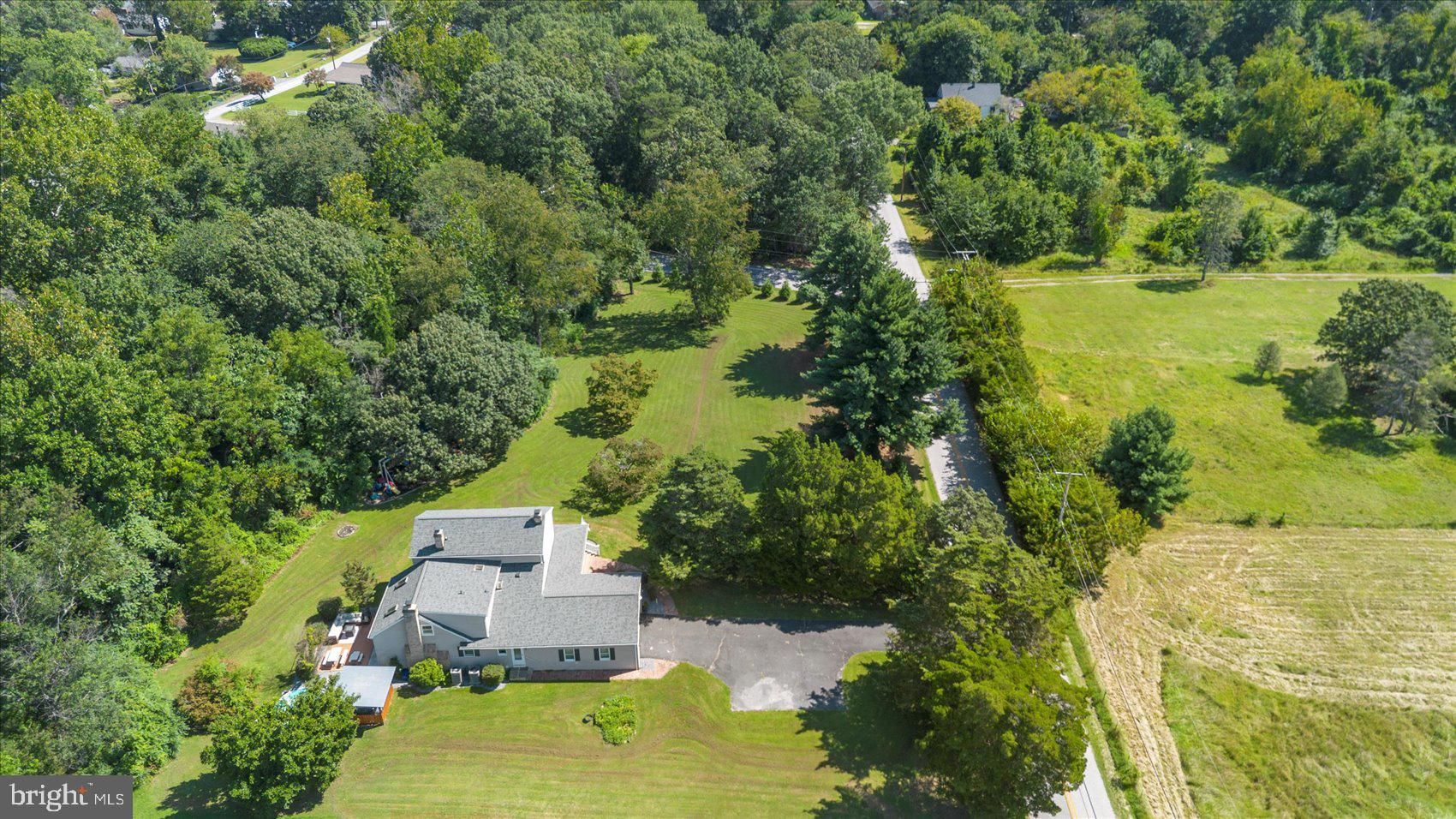 972 Bird River Beach Road Middle River, MD 21220 - Photo 41 of 50 an aerial view of a house with a yard