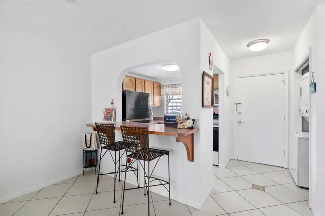 a view of a livingroom with furniture and a flat screen tv