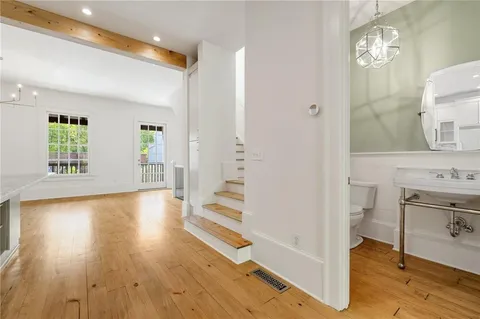 a view of livingroom with hardwood floor and a ceiling fan