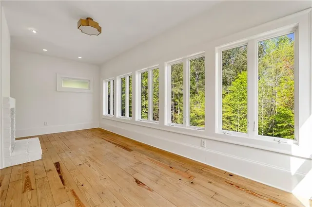 a spacious bathroom with a double vanity sink and shower