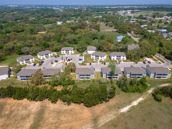 an aerial view of a city with lots of residential buildings