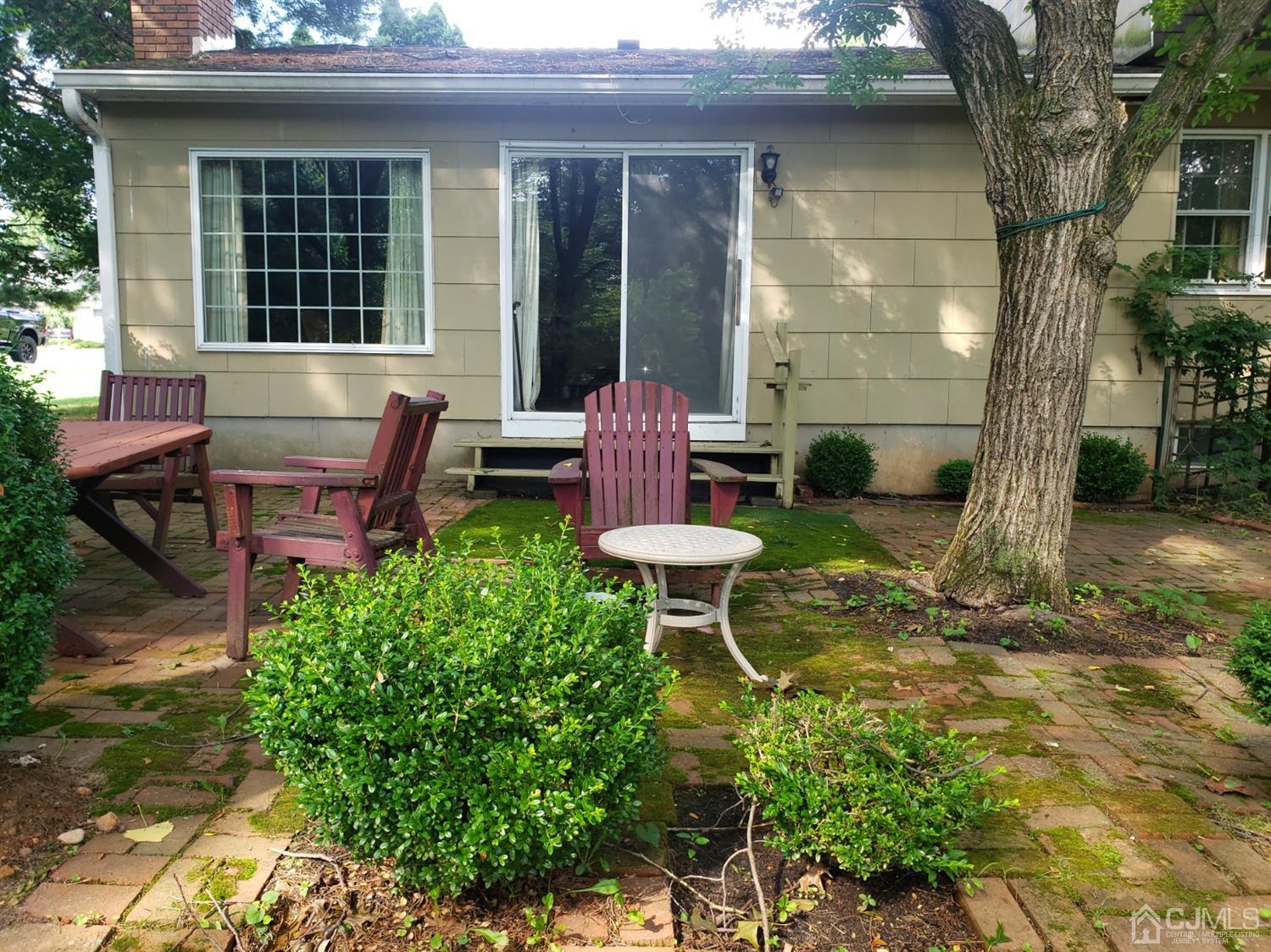 106 Fairfield Road Princeton, NJ 08540 - Photo 28 of 29 a view of a table and chairs in back yard of a house