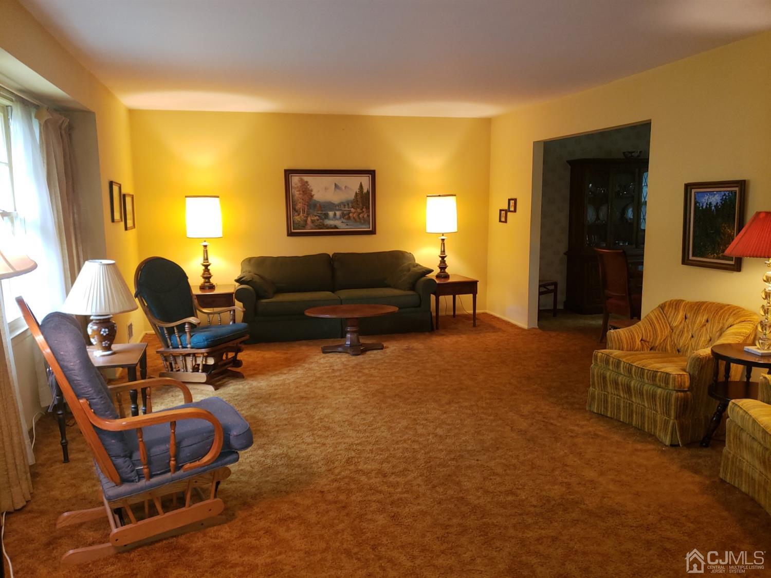 106 Fairfield Road Princeton, NJ 08540 - Photo 4 of 29 a living room with furniture and a window