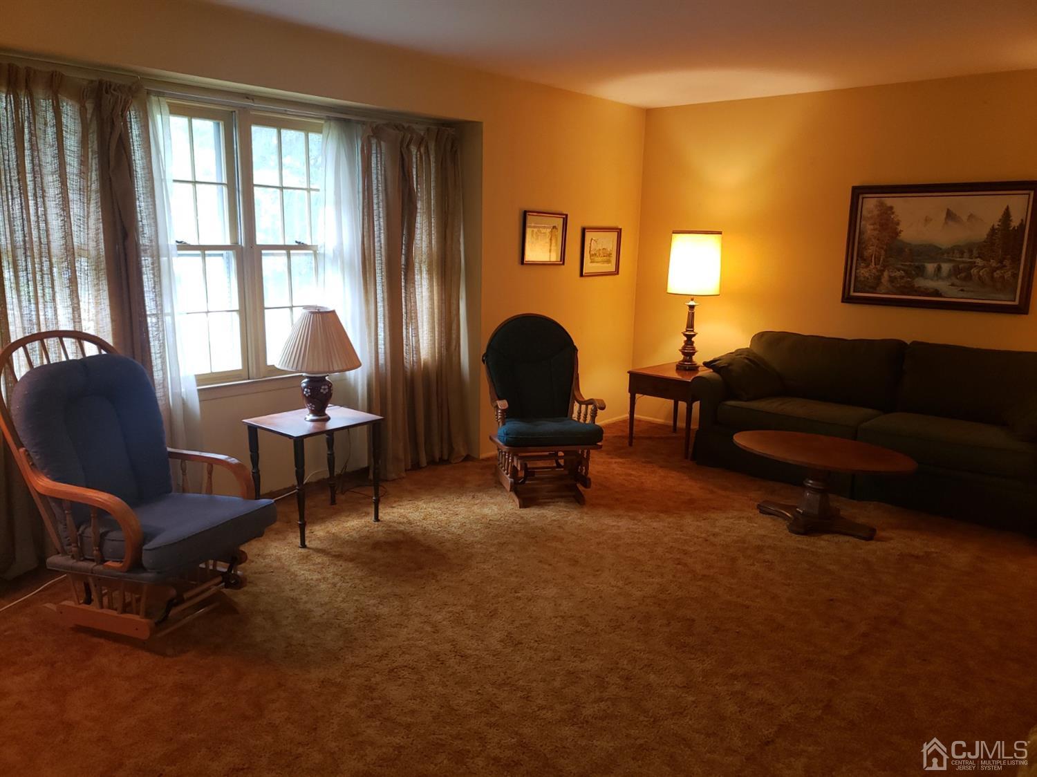 106 Fairfield Road Princeton, NJ 08540 - Photo 5 of 29 a living room with furniture and a window