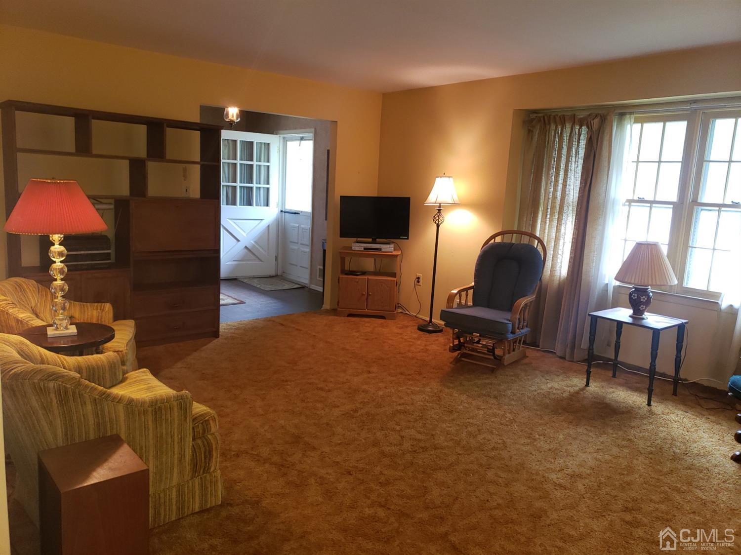 106 Fairfield Road Princeton, NJ 08540 - Photo 6 of 29 a livingroom with workspace and a couch