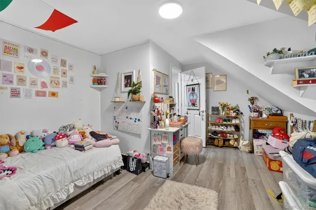 a bedroom with furniture and a bed