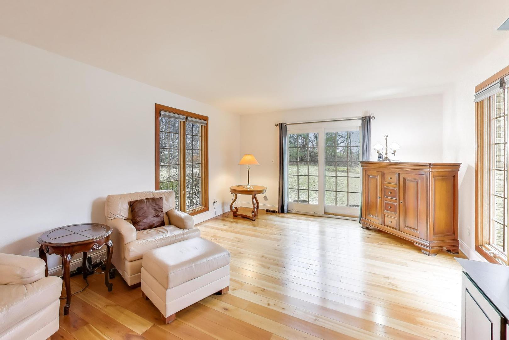 36W787 Red Haw Lane St. Charles, IL 60174 - Photo 23 of 46 a living room with furniture and large windows