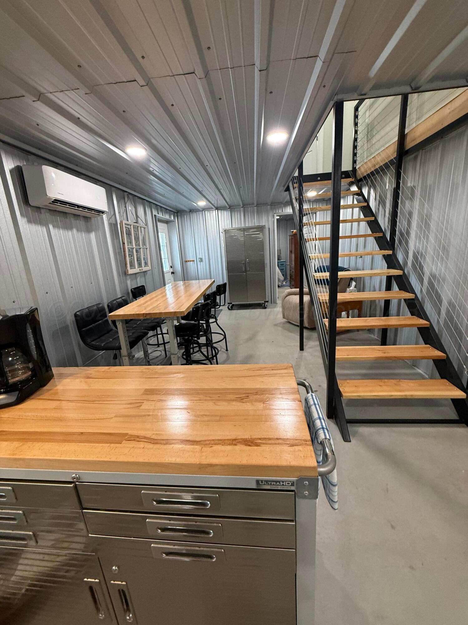 222 Bass Avenue Howardwick, TX 79226 - Photo 12 of 47 a view of an empty room with stairs