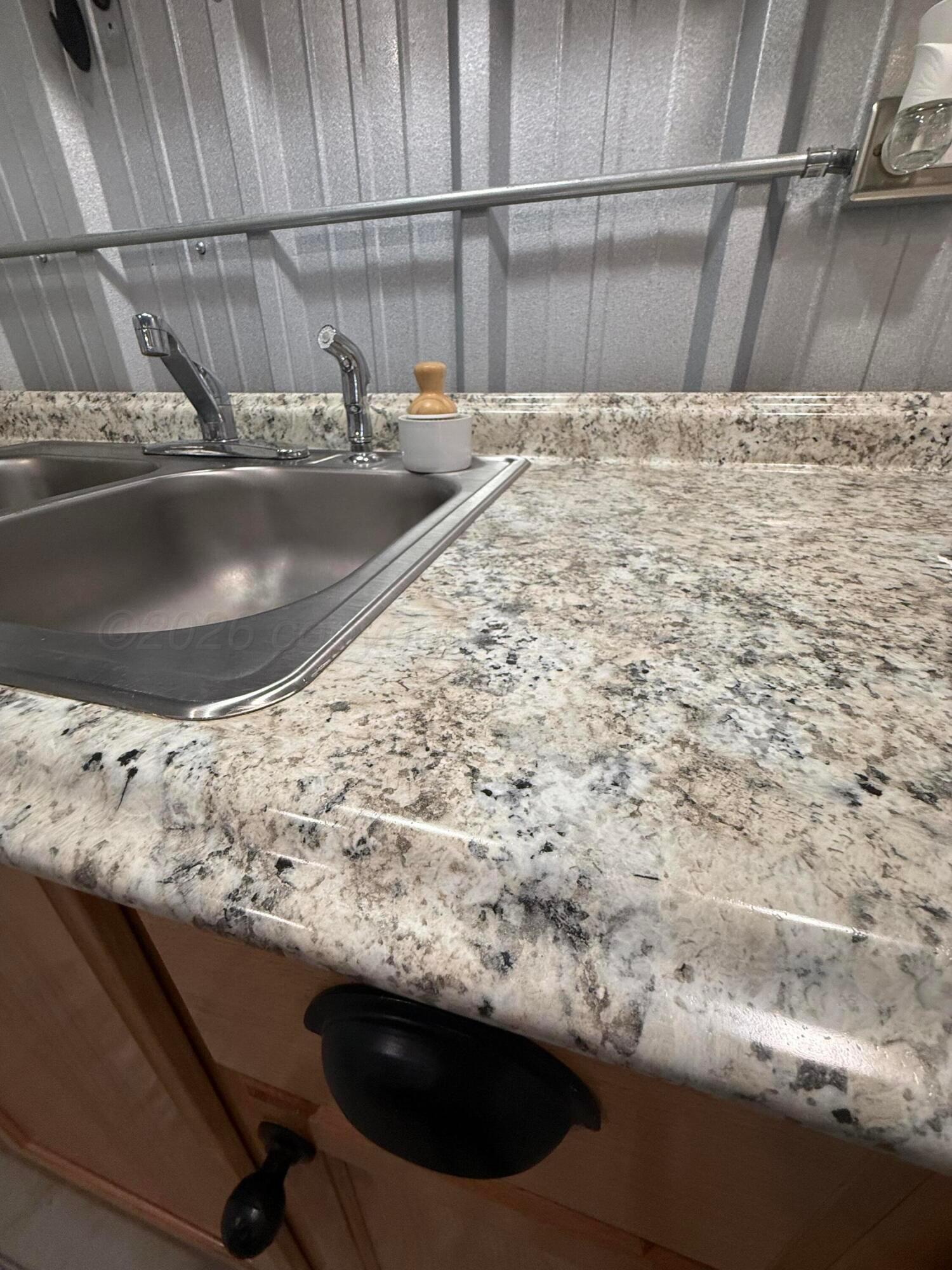 222 Bass Avenue Howardwick, TX 79226 - Photo 17 of 47 a view of sink and tap