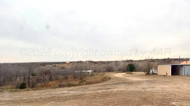 a bed room with a bed and a dresser